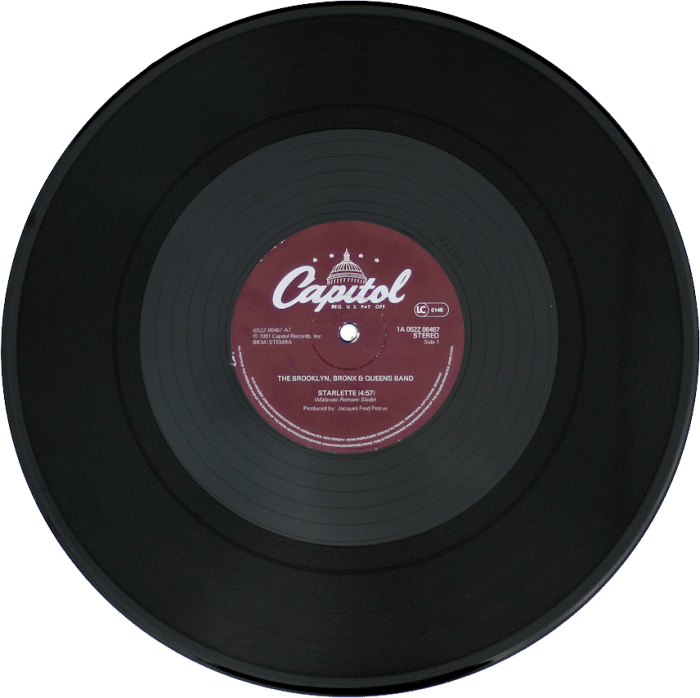 A record rotates on a turntable at 45 rpm .